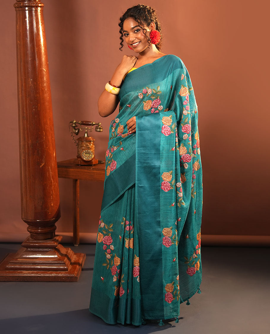 Rama Blue Green-Silk Saree, Colorfully Highlighted with Rose Motifs Cross Stitch Embroidery on Its Body, Subtly Sparkled by a Plain Border, Pallu of Rose Cross Stitch Embroidery, and Paired with a Contrast Blouse