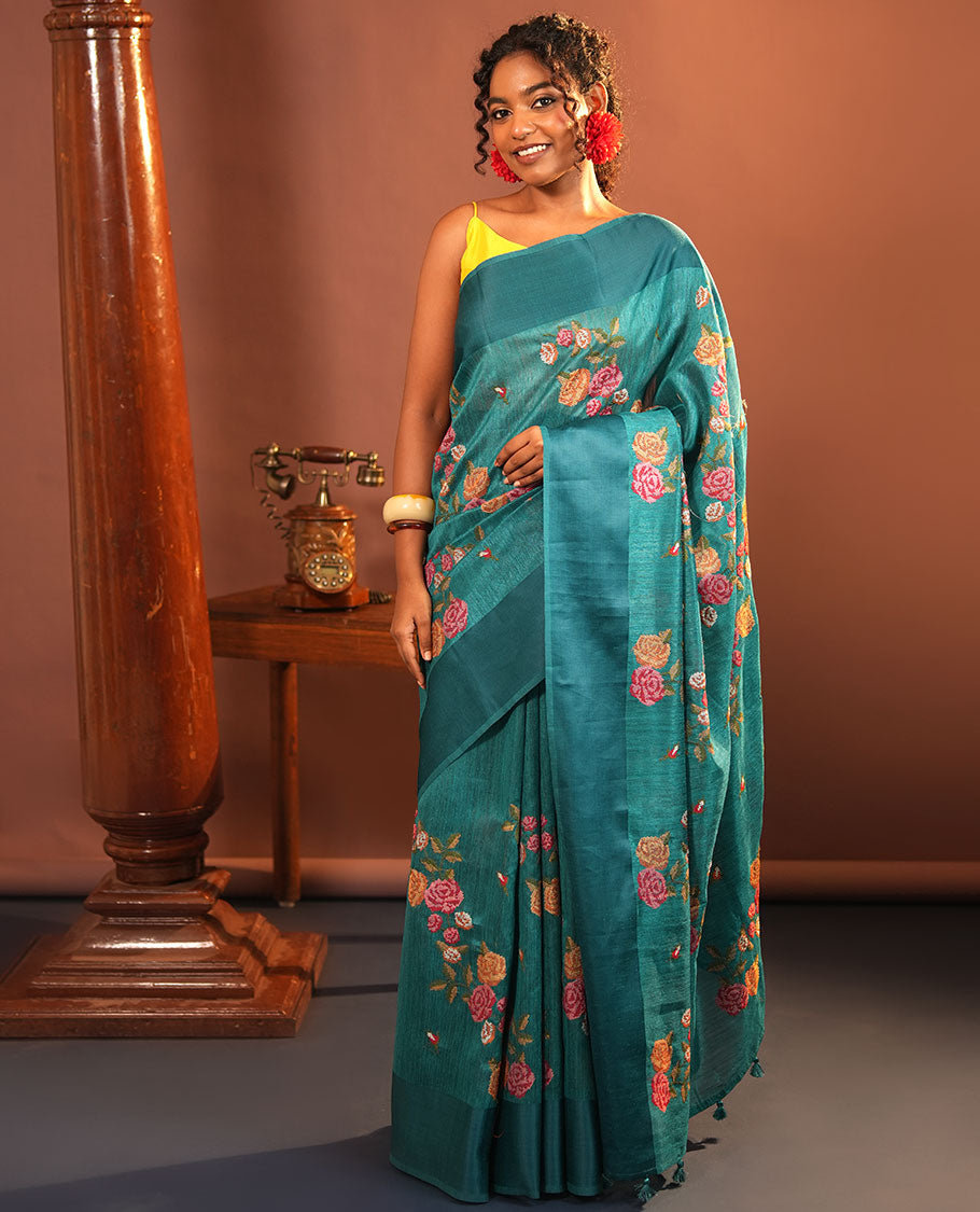 Rama Blue Green-Silk Saree, Colorfully Highlighted with Rose Motifs Cross Stitch Embroidery on Its Body, Subtly Sparkled by a Plain Border, Pallu of Rose Cross Stitch Embroidery, and Paired with a Contrast Blouse