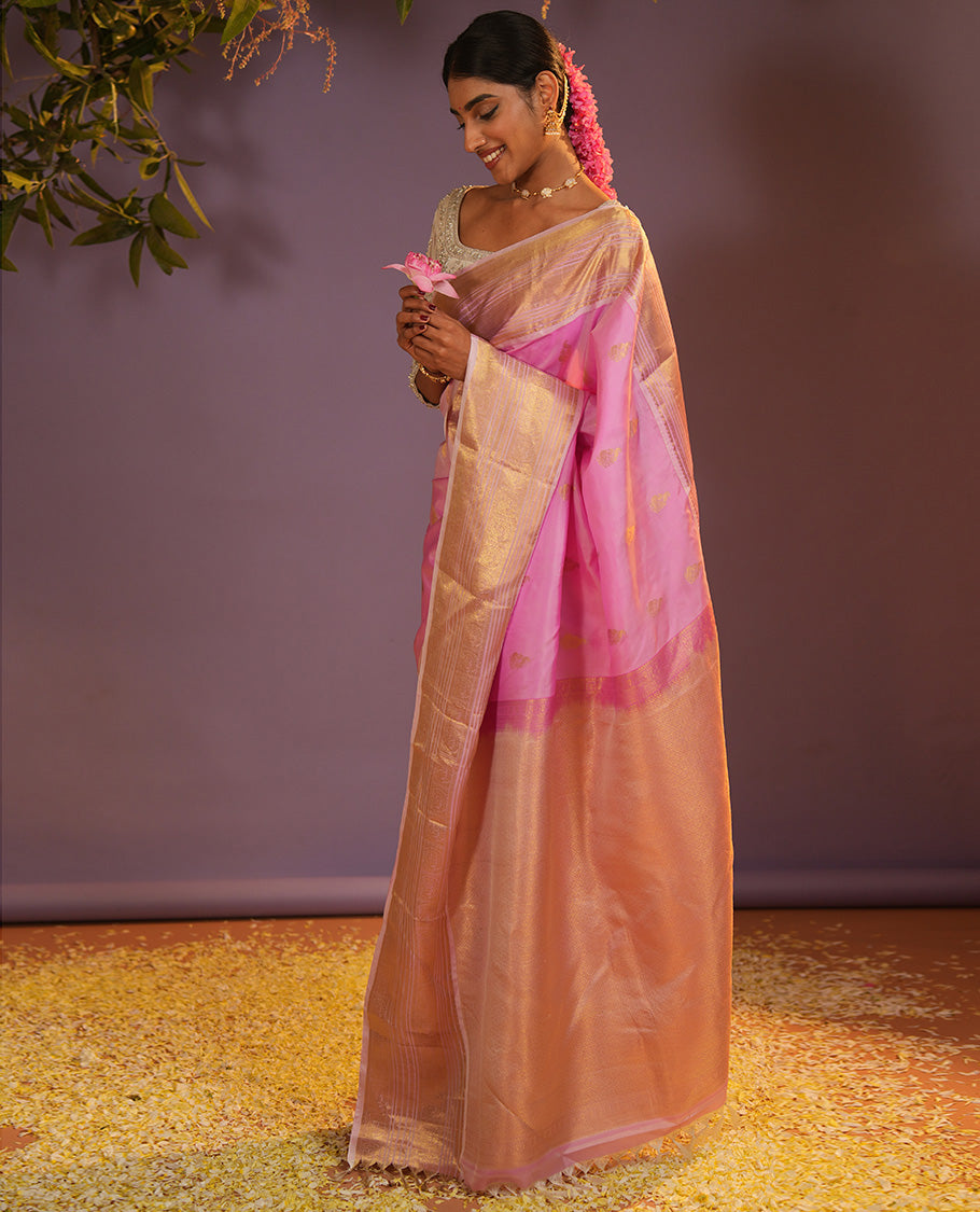 Pink mayil buttas Vasundhara silk saree, zari border of muthu, diamond, mayil kann, kamalam, and mayil designs, and intricate pallu