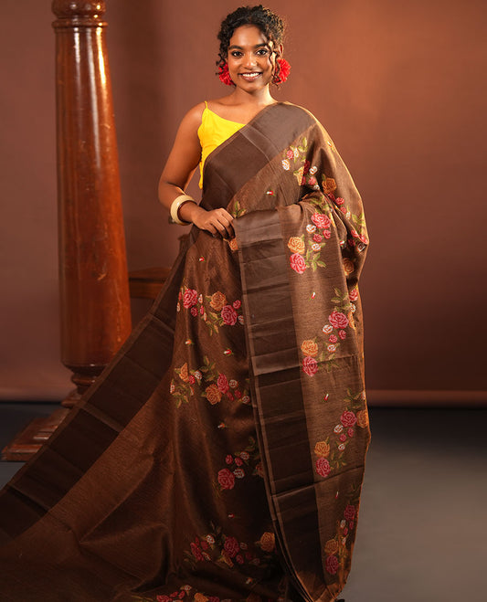 Brown Green-Silk Saree, Colorfully Highlighted with Rose Motifs Cross Stitch Embroidery on Its Body, Subtly Sparkled by a Plain Border, Pallu of Rose Cross Stitch Embroidery, and Paired with a Contrast Blouse