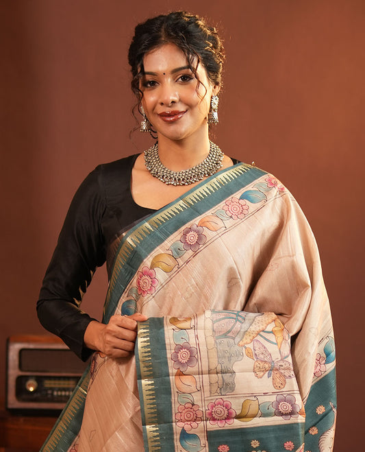 Chikku-Green Fancy Tussar Saree, Artfully Detailed with Kalamkari-Style Floral Print Across Its Body, Complemented by Contrast Temple Zari Border, a Colourfully Kalamkari Printed Pallu, and Paired with a Plain Blouse