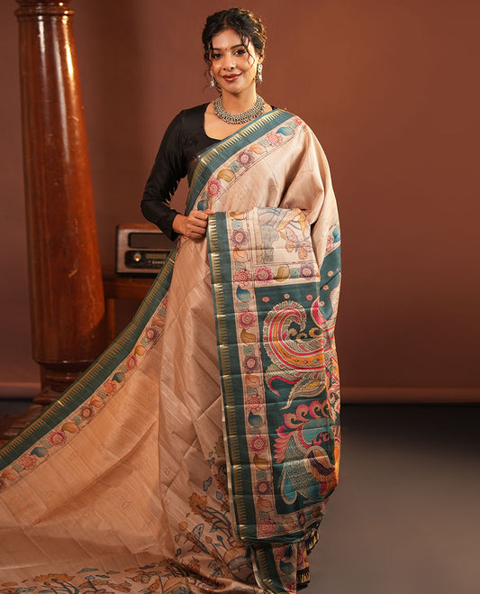 Chikku-Green Fancy Tussar Saree, Artfully Detailed with Kalamkari-Style Floral Print Across Its Body, Complemented by Contrast Temple Zari Border, a Colourfully Kalamkari Printed Pallu, and Paired with a Plain Blouse