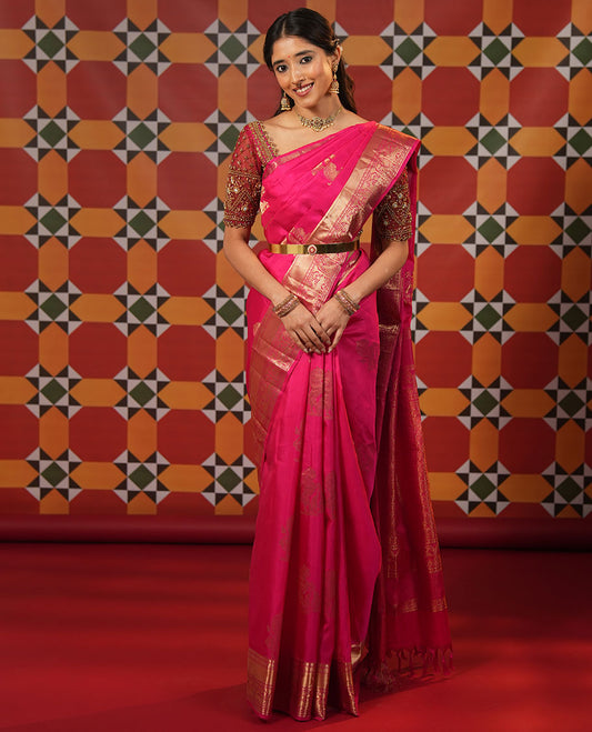 Pink singam and yaanai zari buttas woven silk saree, zari border of mayil kann, rudraksham, muthu, mayil, and yaali designs, and intricate pallu