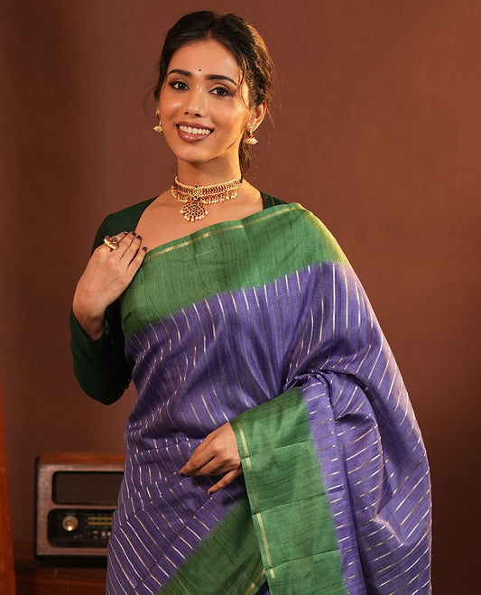 Blue Fancy Tussar Saree, Highlighted by Vertical Zari Stripes Across Its Body, Complemented by Captivating Contrast Geometric Patterned Border, Subtle Pallu and Paired with a Contrast Blouse