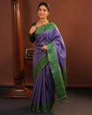 Blue Fancy Tussar Saree, Highlighted by Vertical Zari Stripes Across Its Body, Complemented by Captivating Contrast Geometric Patterned Border, Subtle Pallu and Paired with a Contrast Blouse