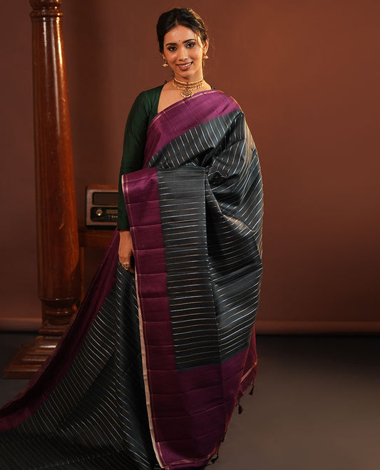 Grey Fancy Tussar Saree, Highlighted by Vertical Zari Stripes Across Its Body, Complemented by Captivating Contrast Geometric Patterned Border, Subtle Pallu and Paired with a Contrast Blouse