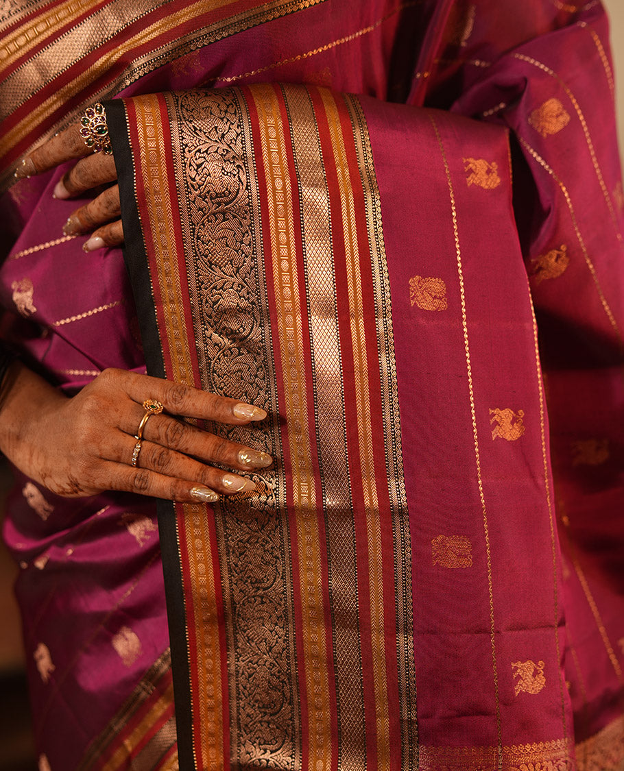 Majenta Striped-Mayil Buttas Vasundhara Silksaree, Contrast Border of Mayil Kann, Mayil, and Yaali, Jaal Pallu, and a Contrast Blouse
