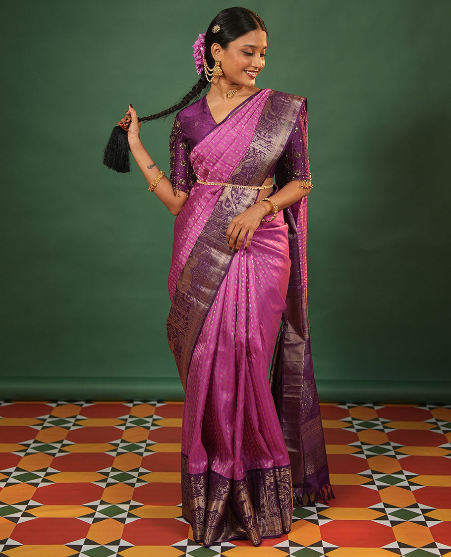 Onion Pink Vasundhara Silk Saree Delicately Woven with Varai Oosai and Rudraksham Buttas, Captivating Contrast Kuthirai Motifs Zari Woven Border, Intricately Designed Pallu, and Paired with a Contrast Blouse