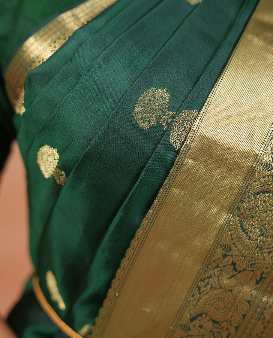 Green zari buttas and mamallapuram temple motifs zari woven silk saree, zari border of salangi, muthu, banaras, mayil, and lavangam designs, and intricate pallu