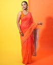 Red-Orange Linen Cotton Saree, Bedecked with Ombre-Style Dyed with Mirror Work Across Its Body, Subtly Sparkled Scallop Thread Border, Pallu Steeped with Stripes and Mirror Work, and Paired with a Contrast Vertical Stripes Printed Blouse