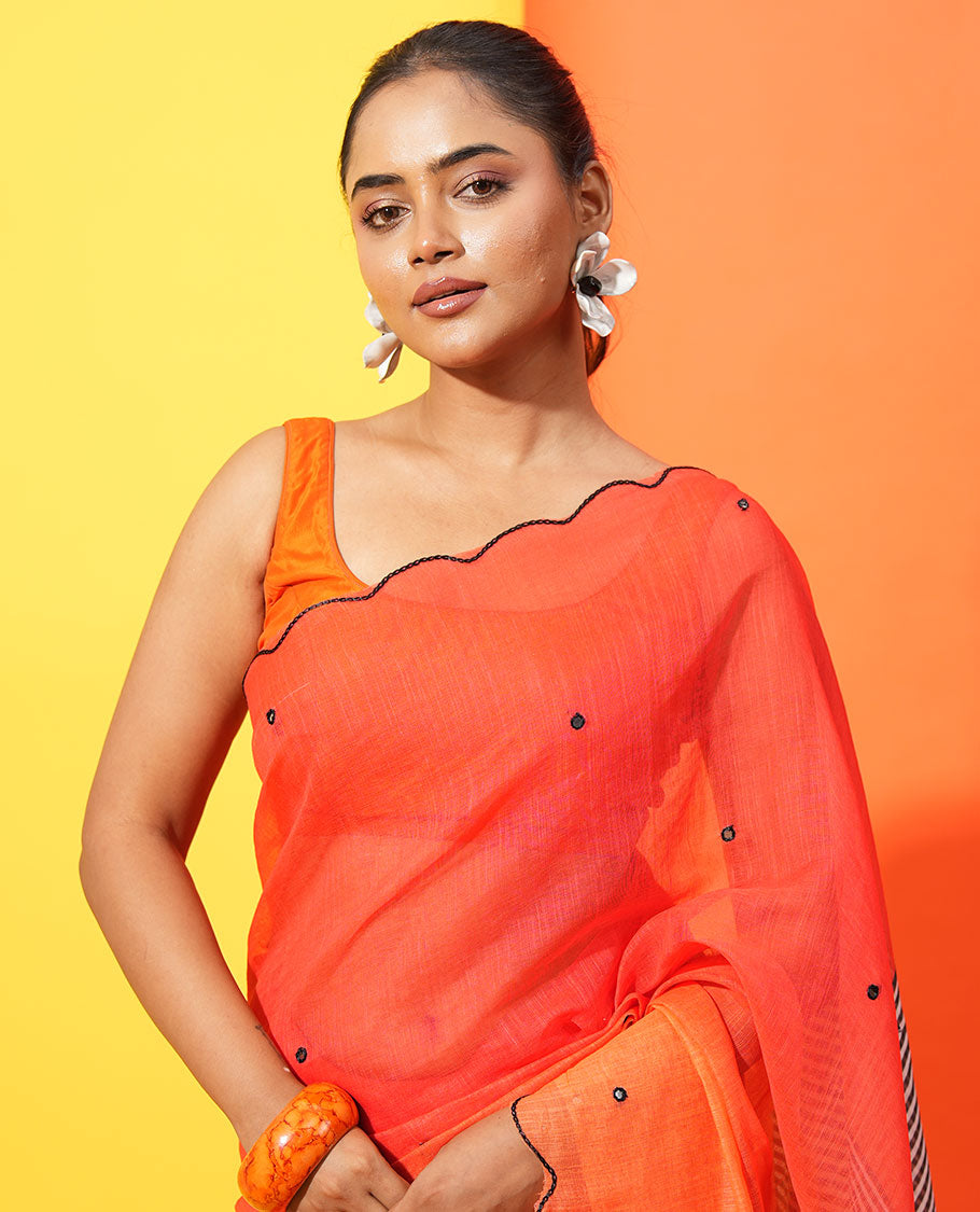 Red-Orange Linen Cotton Saree, Bedecked with Ombre-Style Dyed with Mirror Work Across Its Body, Subtly Sparkled Scallop Thread Border, Pallu Steeped with Stripes and Mirror Work, and Paired with a Contrast Vertical Stripes Printed Blouse