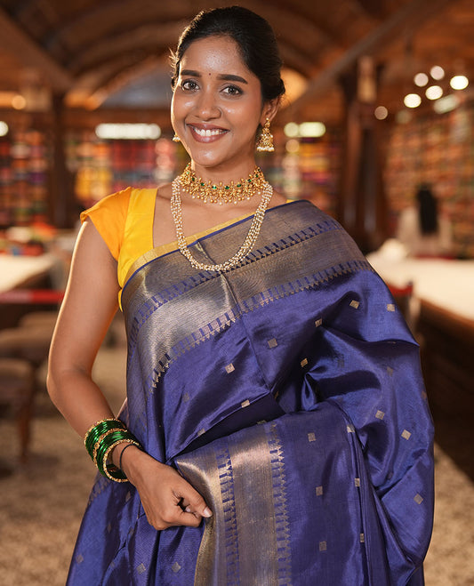 Blue Banana Pith Saree, Enriched with Zari Buttas, a Traditional Zari Border, Zari Striped Pallu, a Matching Blouse