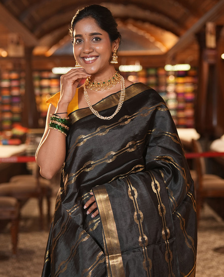 Black Banana Pith Saree, Elevated with Zari Stripes, a Zari Border, Zari Woven Pallu, and a Matching Blouse
