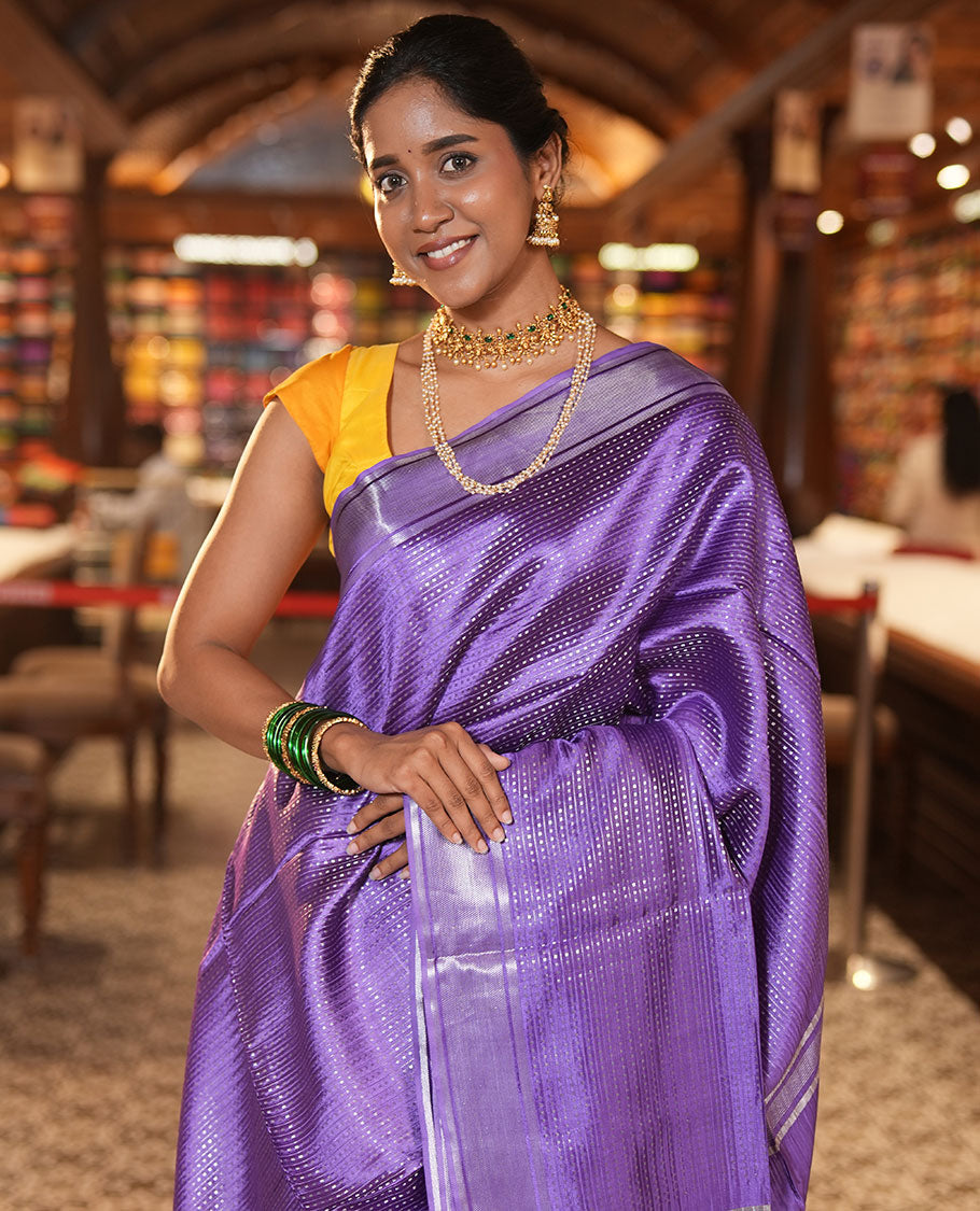 Violet Banana Pith Saree, Bedecked with Zari Stripes and Buttas, a Zari Border, Zari Woven Pallu, a Matching Blouse