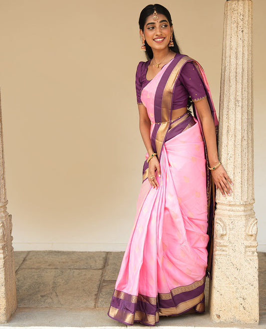 Pink zari buttas woven silk saree, contrast rettai pettu border of laddu kamalam designs, and jaal pallu