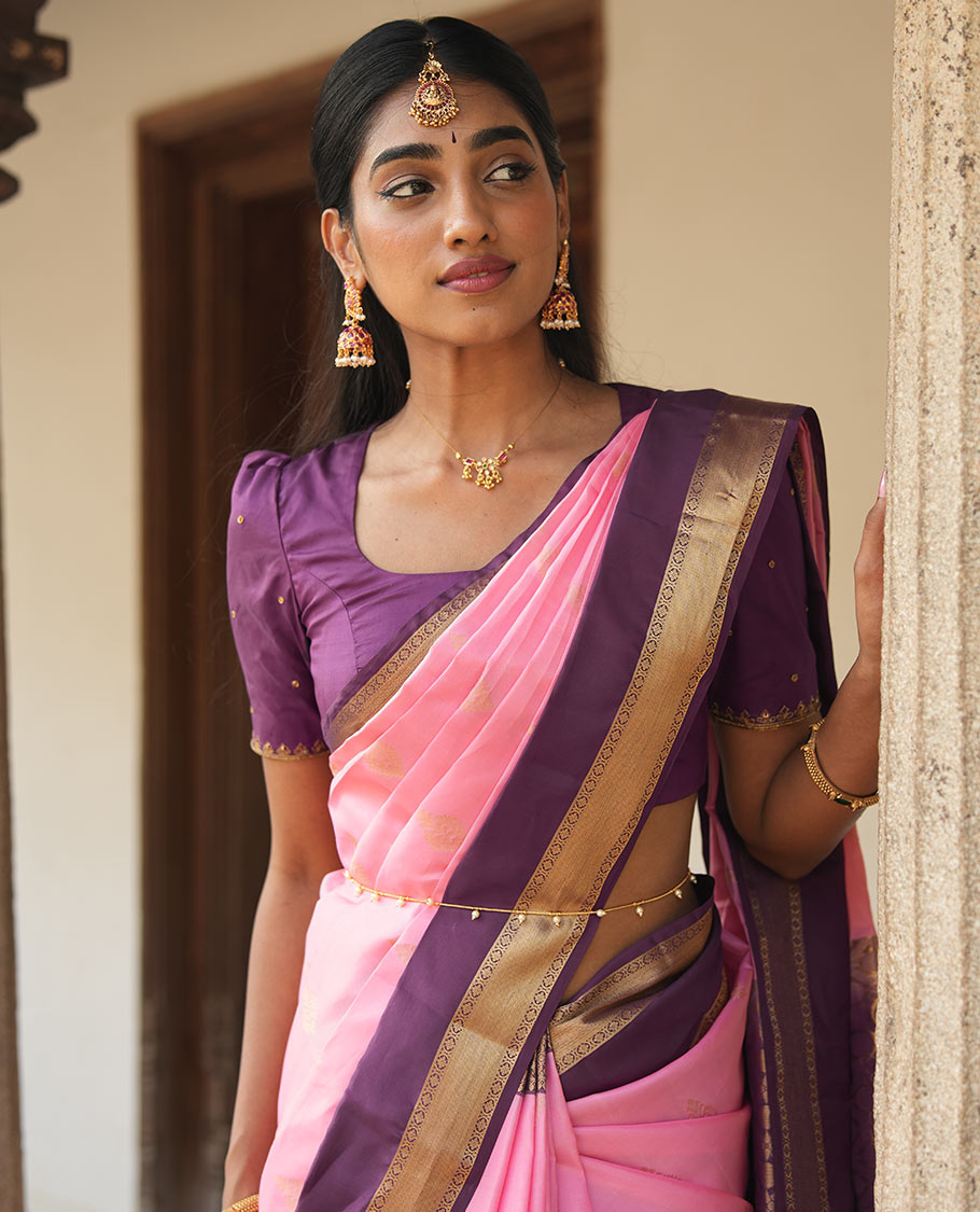 Pink zari buttas woven Vasundhara Lite Silk Mix Saree, contrast rettai pettu border of laddu kamalam designs, and jaal pallu