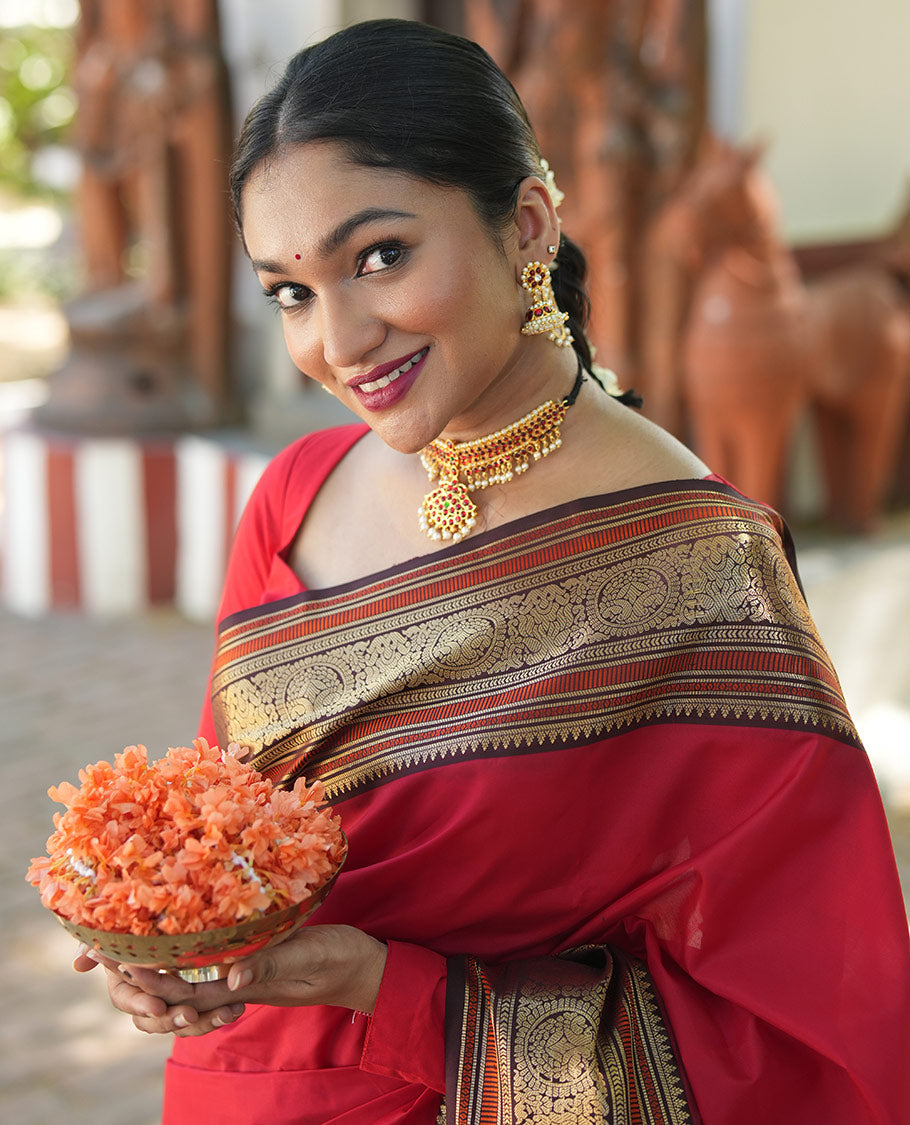Red Plain Vasundhara Lite Silk Saree, Complemented by a Contrast Border of Banaras, Diamond, Muthu, Kathir, and Round Mayil Designs, Grand Jaal Pallu, and Paired with a Contrast Blouse