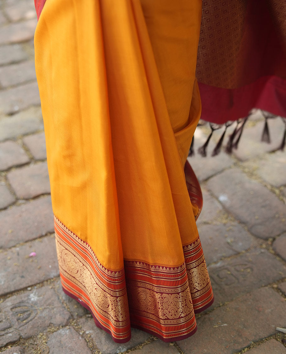 Yellow Plain Vasundhara Lite Silk Saree, Complemented by a Contrast Border of Banaras, Diamond, Muthu, Kathir, and Round Mayil Designs, Grand Jaal Pallu, and Paired with a Contrast Blouse