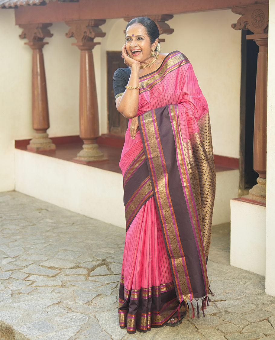 Pink Vasundhara Lite Silk Saree, Subtly Detailed with Thread and Zari Stripes, Complemented by Contrast Rettai Pettu Border of Salngai, Cross Kamalam, Muthu, Kathir, Diamond, and Arumbu Manga Designs, Grand Jaal Pallu, and Paired with a Contrast Blouse