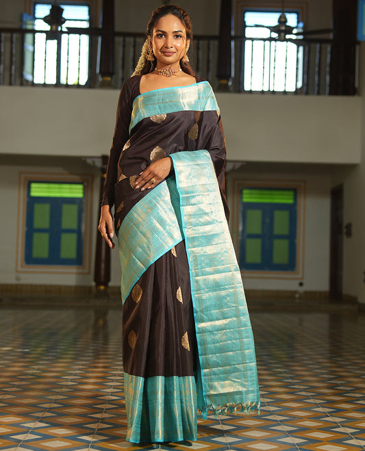 Brown Vasundhara Silk Saree, Spotlighted with Zari Buttas All Over Its Body, Complemented by a Contrast Border of Kodi Visiry Designs, a Grand Pallu, and Paired with a Contrast Blouse