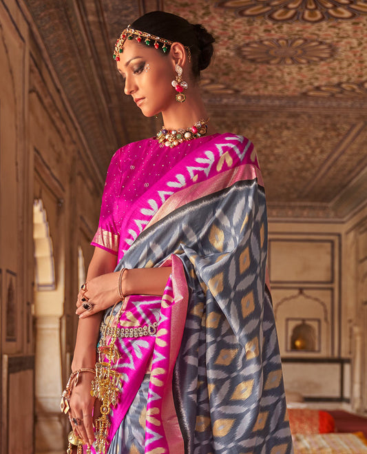 Grey ikkat jaal patterned fancy tussar designer catalog saree, contrast chevron ikkat border, and ikkat design pallu