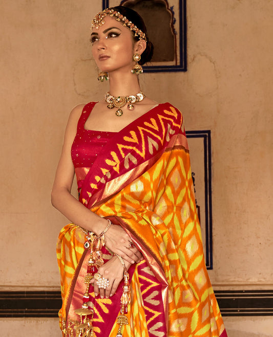 Orange ikkat jaal patterned fancy tussar designer catalog saree, contrast chevron ikkat border, and ikkat design pallu