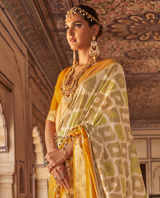 Grey-Yellow ikkat patterned designer catalog saree, contrast ikkat border, and ikat woven pallu