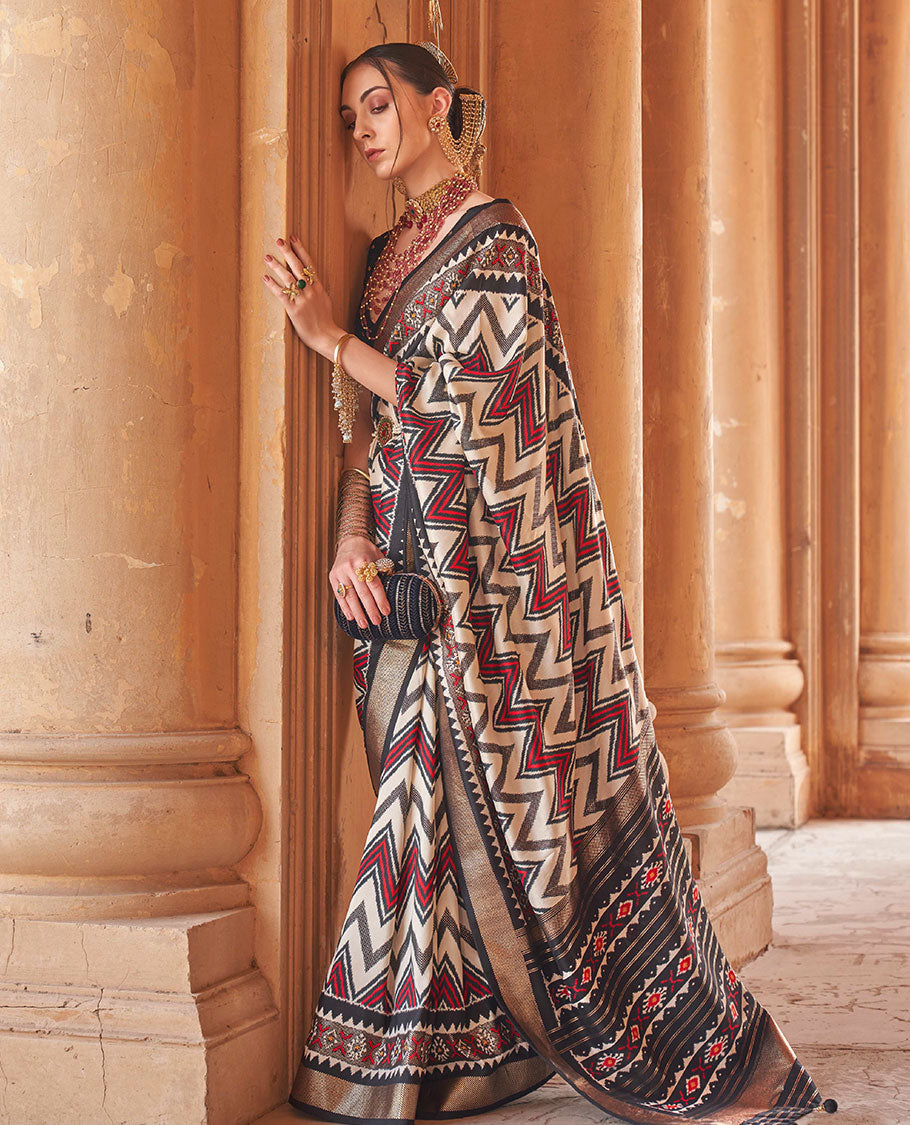 Cream and black chevron stripes printed designer saree, geometric printed border, and ikkat design pallu