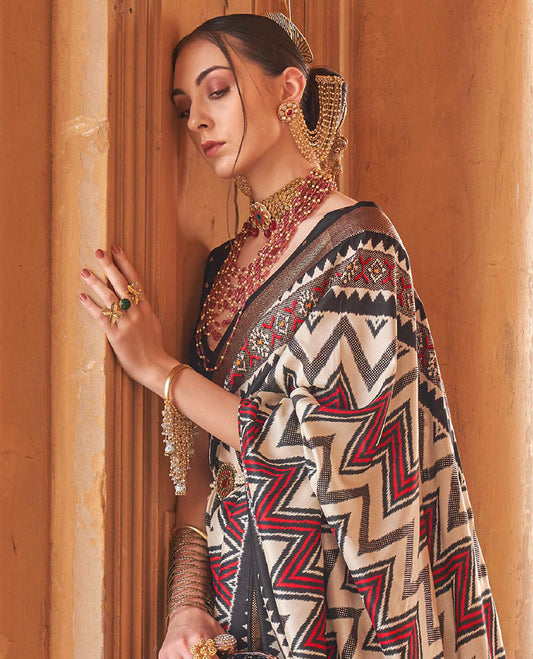 Cream and black chevron stripes printed designer saree, geometric printed border, and ikkat design pallu