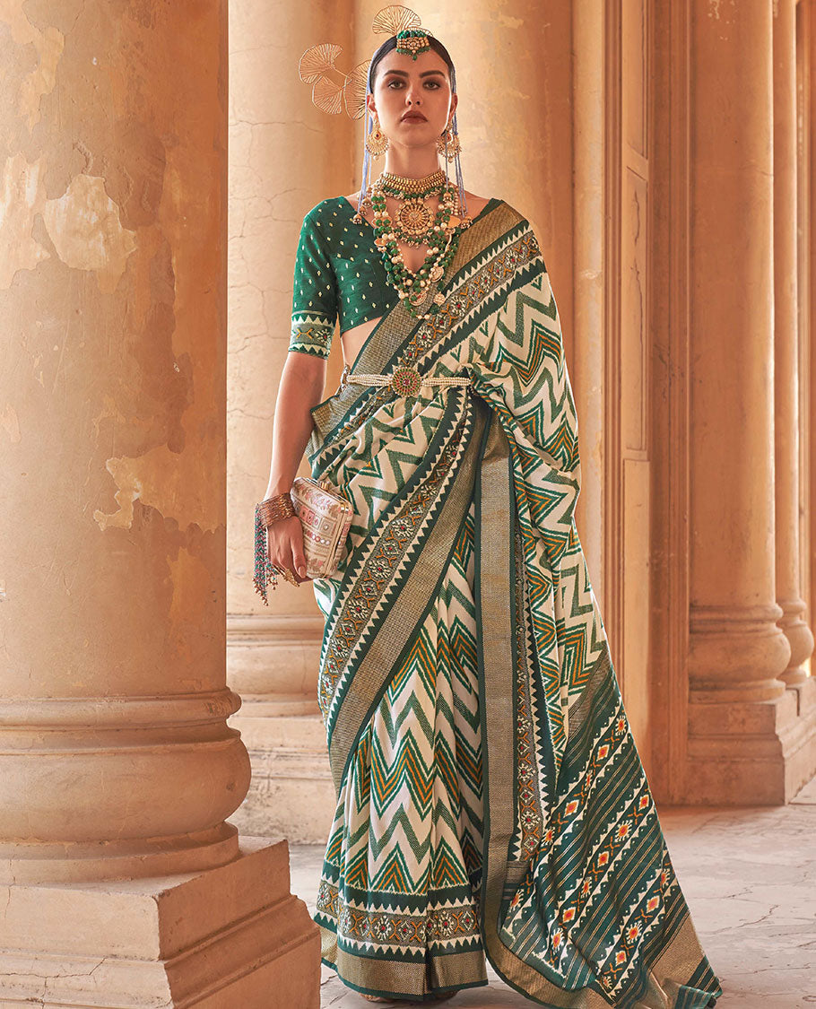 Cream and green chevron stripes printed designer saree, geometric printed border, and ikkat design pallu