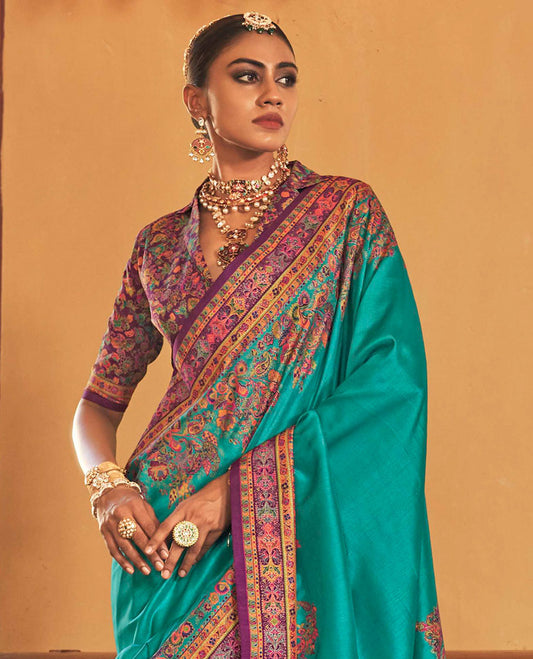 Persian green plain with meenakari-style floral-paisleys printed designer saree, contrast floral-paisleys Mughal-style printed border, and pallu