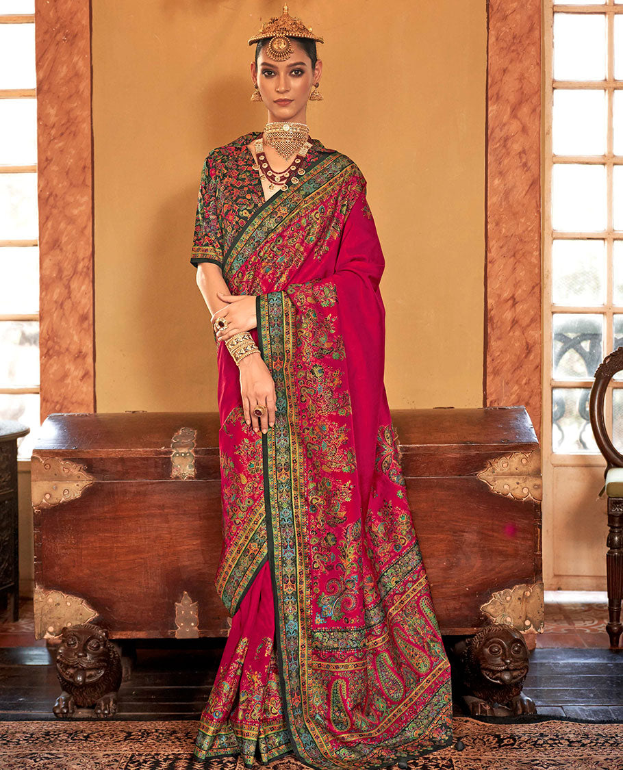 Tomato red plain with meenakari-style floral-paisleys printed designer saree, contrast floral-paisleys Mughal-style printed border, and pallu