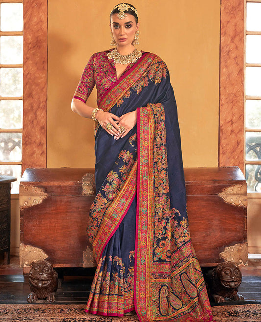 Navy blue plain with meenakari-style floral-paisleys printed designer saree, contrast floral-paisleys Mughal-style printed border, and pallu