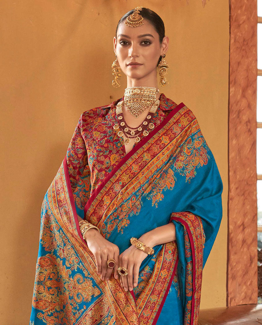 Blue plain with meenakari-style floral-paisleys printed designer saree, contrast floral-paisleys Mughal-style printed border, and pallu