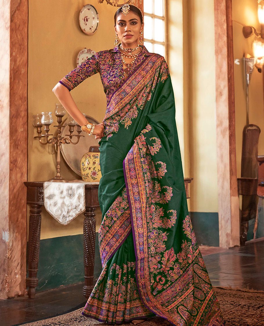 Green plain with meenakari-style floral-paisleys printed designer saree, contrast floral-paisleys Mughal-style printed border, and pallu