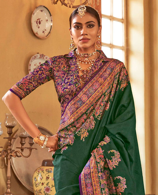 Green plain with meenakari-style floral-paisleys printed designer saree, contrast floral-paisleys Mughal-style printed border, and pallu