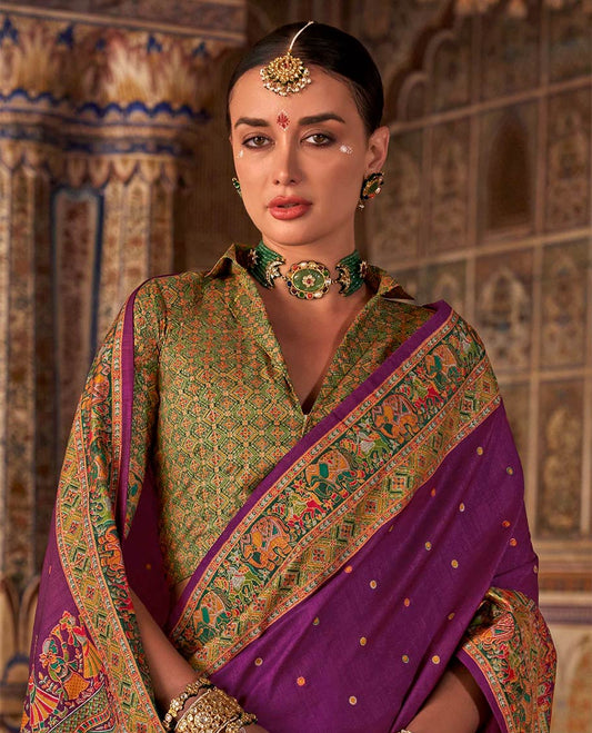 Purple meena buttas designer catalog saree, contrast meenakari border of human and elephant motifs, and wedding theme meenakari pallu