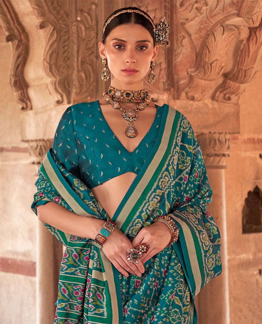 Rama Ikat Patola Designer Saree, Decorated with Intricate Ikat Designs, Highlighted by Intricate Ikat Border, Intricate Pallu, and a Matching Blouse