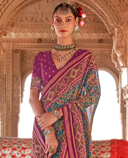 Rama Ikat Patola Designer Saree, Accentuated with Intricate Ikat Designs, Complemented by a Contrast Ikat Border, Intricate Pallu, and a Contrast Blouse