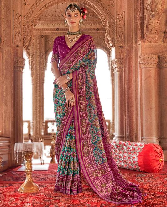 Rama Ikat Patola Designer Saree, Accentuated with Intricate Ikat Designs, Complemented by a Contrast Ikat Border, Intricate Pallu, and a Contrast Blouse