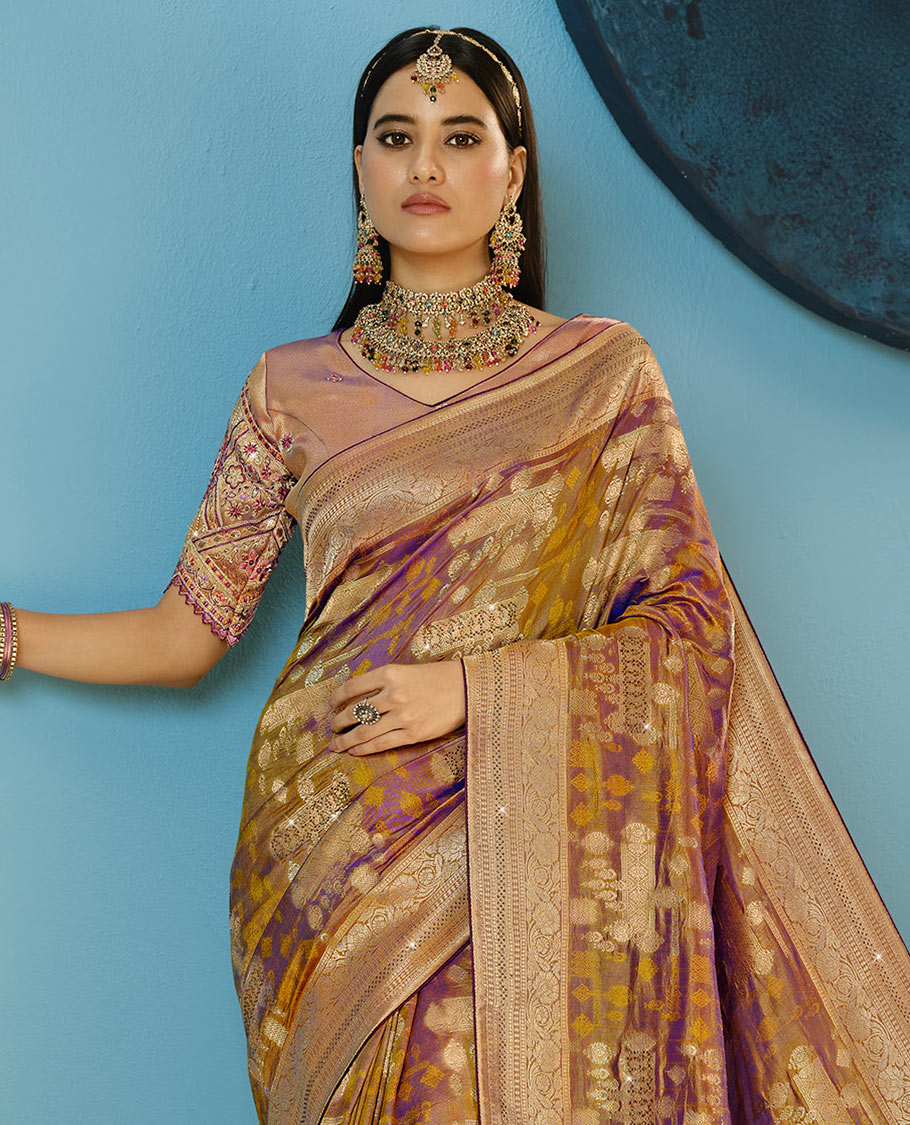 Green Designer Saree Beautified with Buttas and Stone Work, Traditional Motifs Woven Border, and Pallu Embroidered with Geometric Motifs, Along with a Contrast Embroidery Blouse