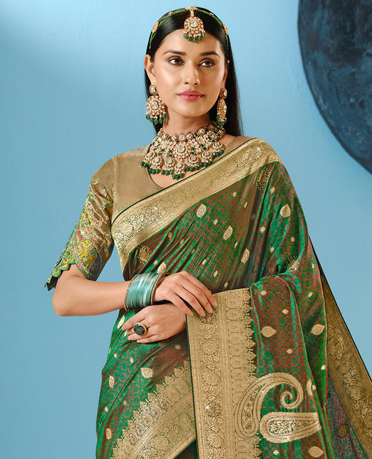 Green Designer Saree Highlighted with Buttas and Stone Work, Intricate Motifs Woven Border, and Pallu Embroidered with Flora-Fauna Motifs, Along with a Contrast Embroidery Blouse
