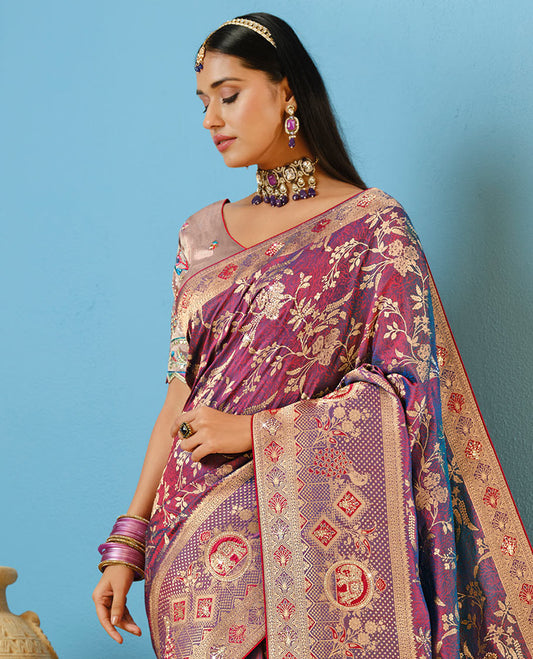 Purple Designer Saree Adorned with Floral Vine and Stonework, a Contrast Border Featuring Meenakari Design and Stonework, Pallu Depicting Floral-Peacock Motifs, and a Contrast Blouse Complemented by Embroidery