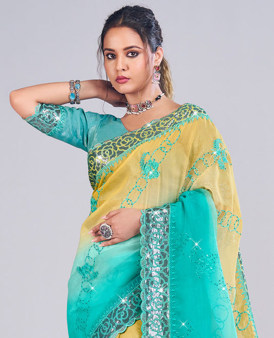 Yellow and blue ombre colored diagonal striped thread and sequins work designer catalog saree, floral sequins work border