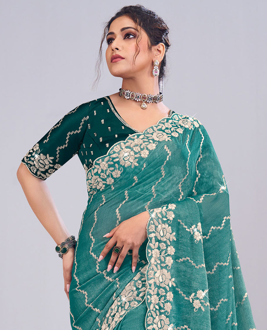 Green zig-zag striped designer catalog saree, scallop embossed embroidered floral creeper border