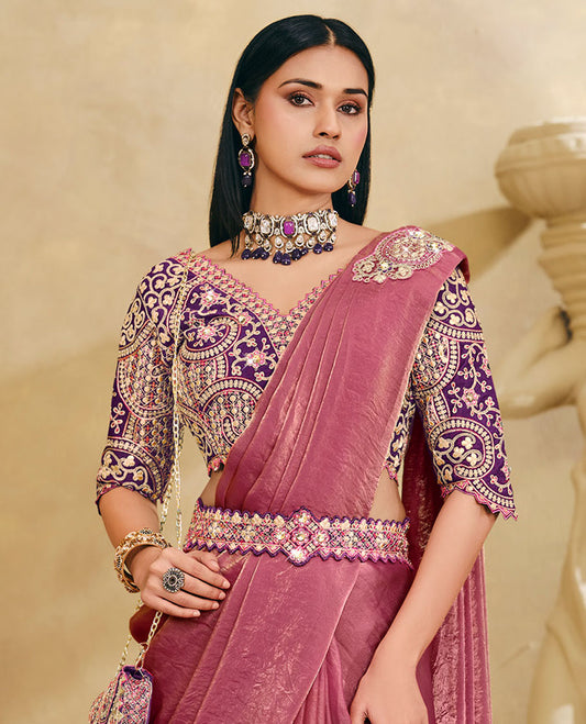 Pink Plain Party Wear Designer Saree, Complemented with a Contrast V-Neck Heavy Embroidered Elbow Sleeve Readymade Blouse, Detachable Embroidered Belt, and a Free Embroidered Flap Sling Bag