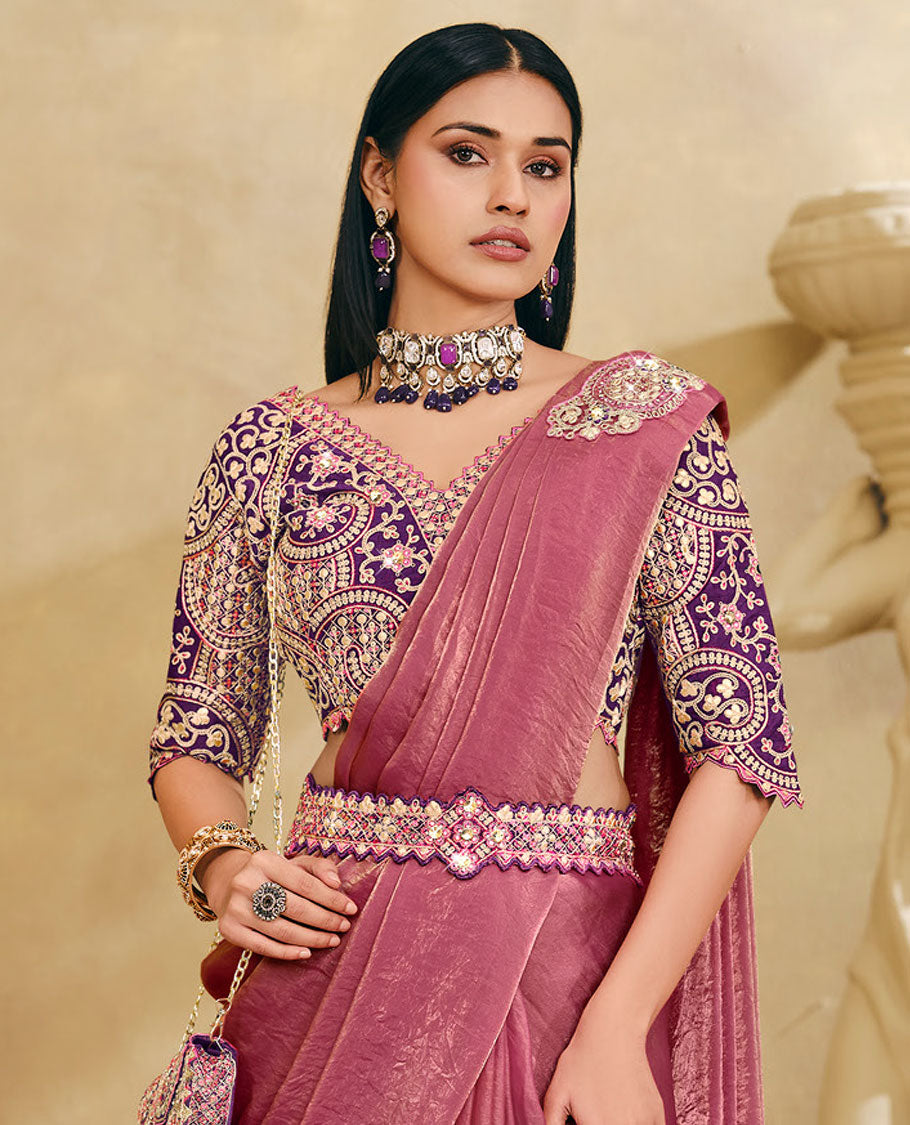 Pink Plain Party Wear Designer Saree, Complemented with a Contrast V-Neck Heavy Embroidered Elbow Sleeve Readymade Blouse, Detachable Embroidered Belt, and a Free Embroidered Flap Sling Bag