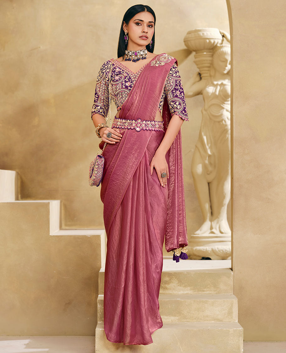 Pink Plain Party Wear Designer Saree, Complemented with a Contrast V-Neck Heavy Embroidered Elbow Sleeve Readymade Blouse, Detachable Embroidered Belt, and a Free Embroidered Flap Sling Bag