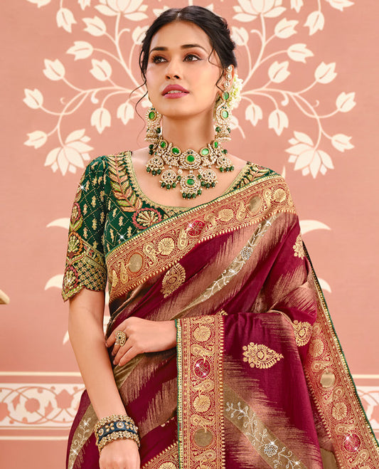 Maroon Dola Silk Designer Catalog Saree with Buttas and Floral Creeper, a Contrast Embroidered Blouse