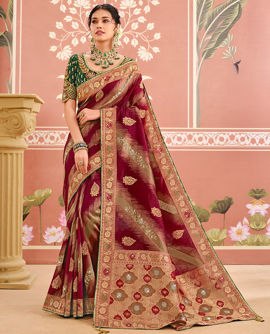 Maroon Dola Silk Designer Catalog Saree with Buttas and Floral Creeper, a Contrast Embroidered Blouse